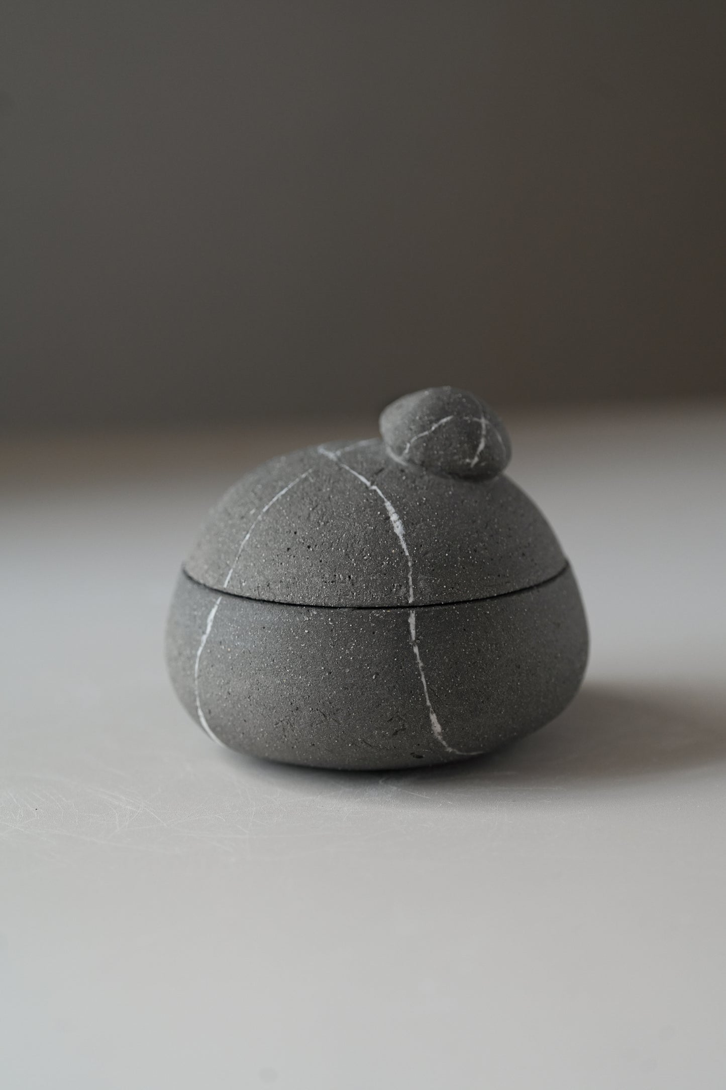 Stillness Pebble 037 / Dark Grey Box